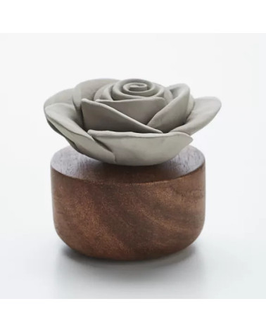 Diffuseur de parfum et huiles essentielles. Fleur en porcelaine, base